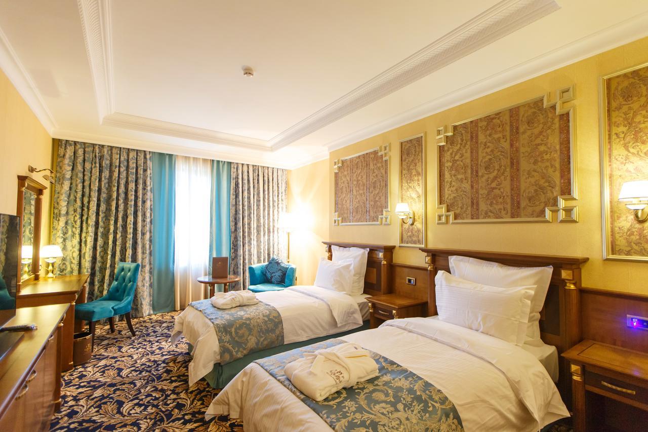 Sultan Palace Hotel Atyraū Eksteriør bilde A room at the hotel